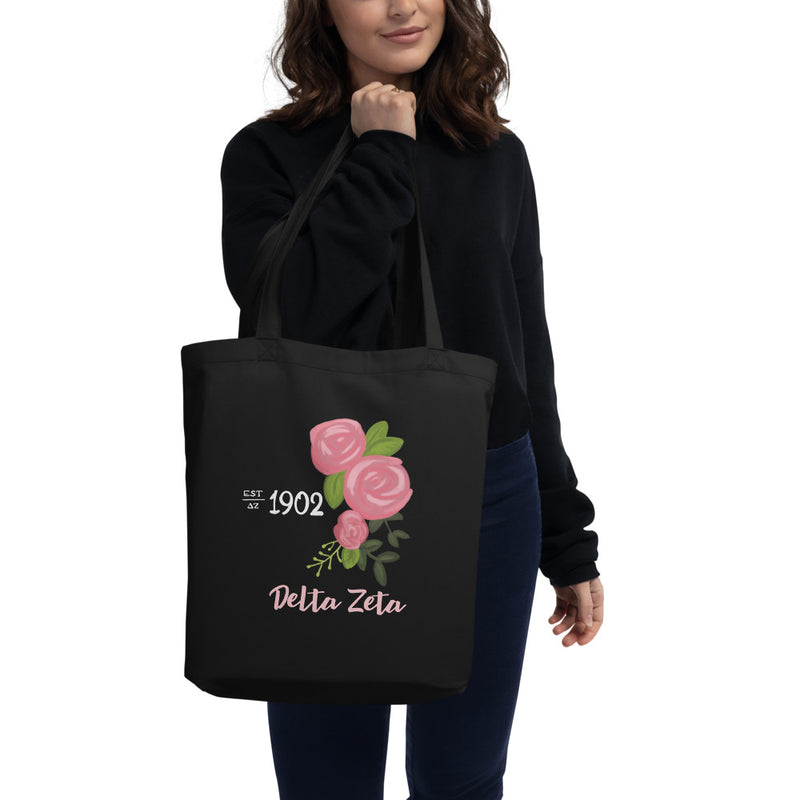 Delta Zeta 1902 Founders Day Eco Tote Bag in black on model