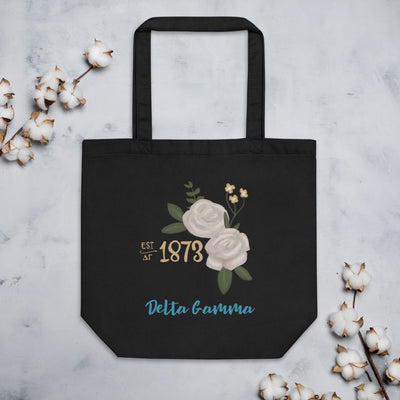 Delta Gamma 1873 Founders Day Eco Tote Bag shown in black with cotton blossoms