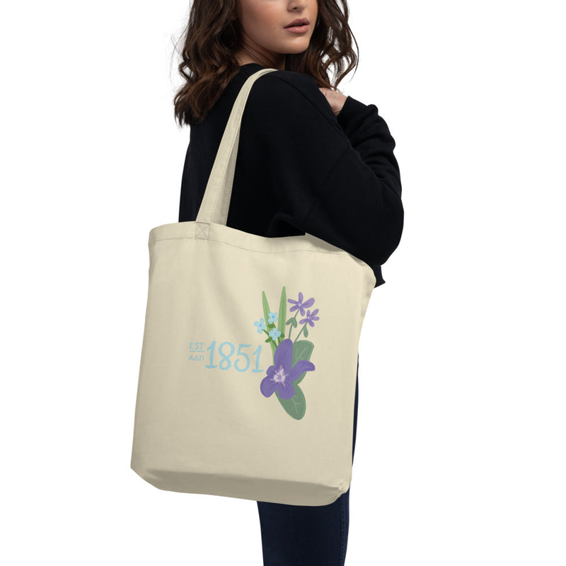Alpha Delta Pi Founders Day Eco Tote Bag in natural oyster color on woman&