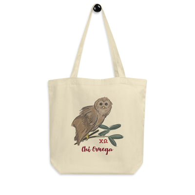 Chi Omega Owl Eco Tote Bag in natural oyster shown on a hook