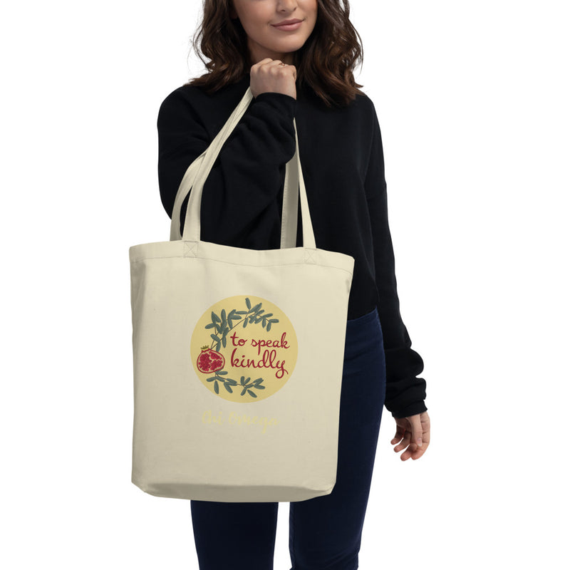 Chi Omega To Speak Kindly Eco Tote Bag in natural oyster shown on model&