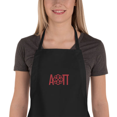 Alpha Omicron Pi Embroidered Apron in black shown on model close up