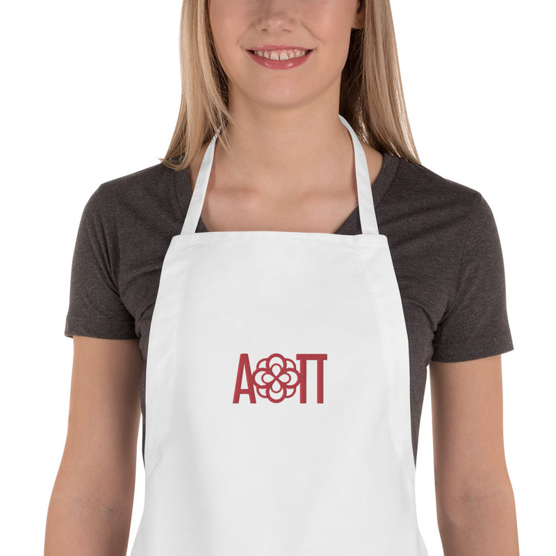Alpha Omicron Pi Embroidered Apron shown in white on model close up