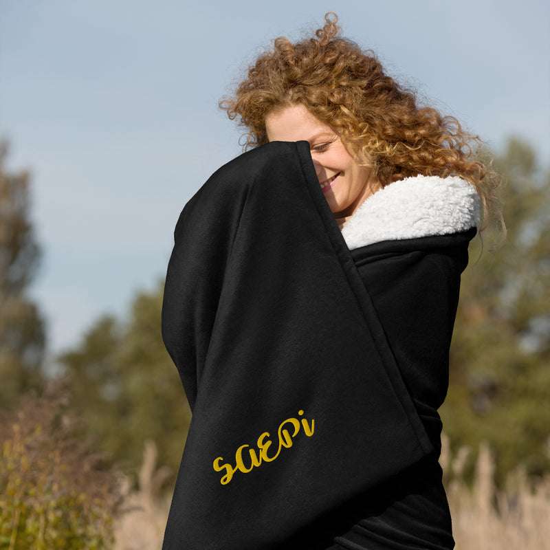 Sigma Alpha Epsilon Pi Embroidered Sherpa Blanket in black on model
