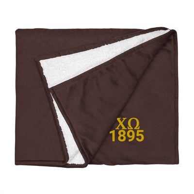 Chi Omega Plush Embroidered Sherpa Blanket in brown flat
