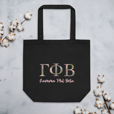 Gamma Phi Beta Sorority Letters Tote Bag shown in black with cotton blossoms