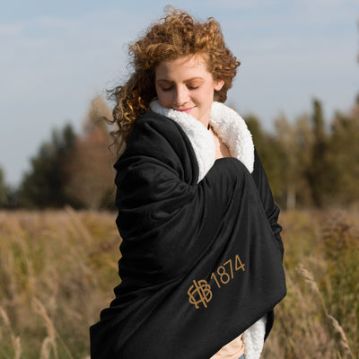 Gamma Phi Beta Plus Embroidered Sherpa Blanket in black on model