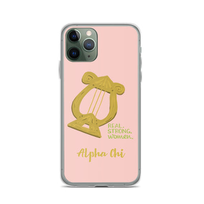 Alpha Chi Omega pink iPhone case with a Lyre and the words Real. Strong. Women on iPhone 11 Pro phone case. 