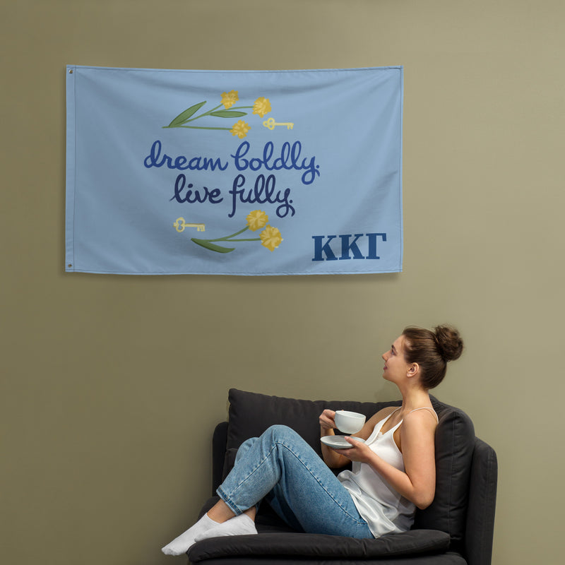 Kappa Kappa Gamma Dream Boldly. Live Fully Flag shown in lifestyle setting with model