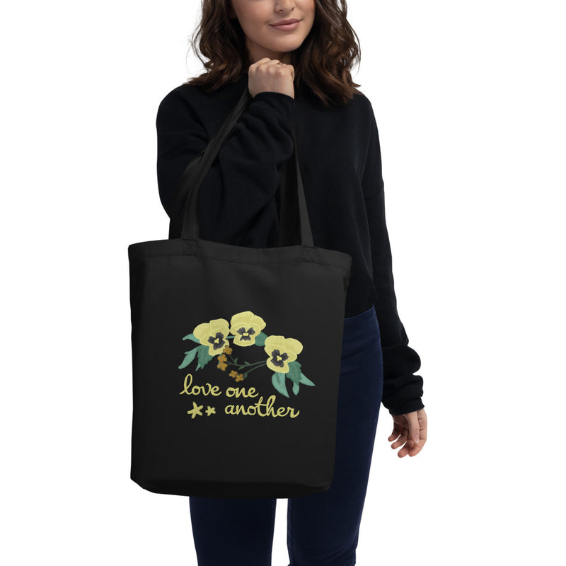 Kappa Alpha Theta Love One Another Eco Tote Bag in black on model&