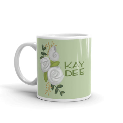 Kappa Delta Kay Dee Light Green Mug in 11 oz size with handle on left