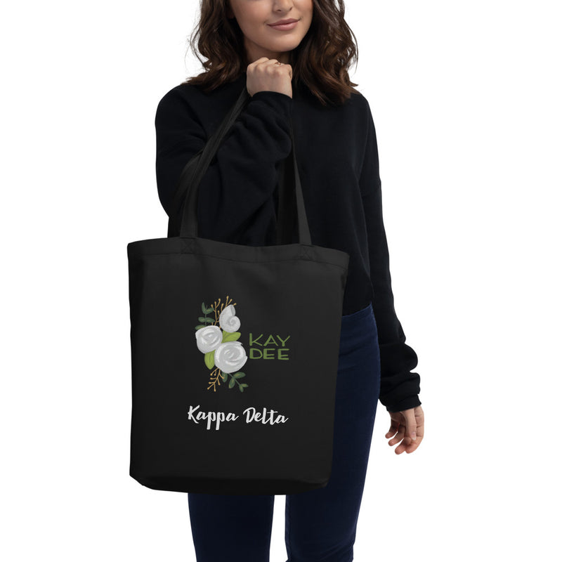 Kappa Delta Kay Dee White Rose Eco Tote Bag in black on model
