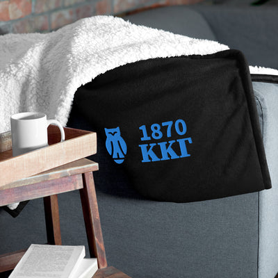 Kappa Kappa Gamma Plush Embroidered Sherpa Blanket in black on couch