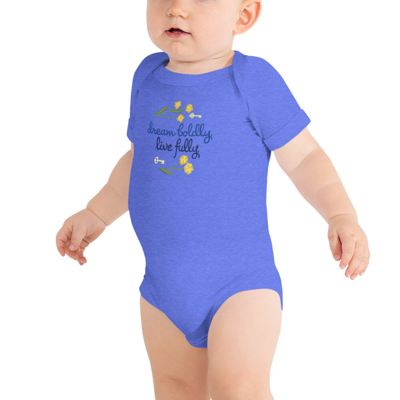 Kappa Kappa Gamma Dream Boldly. Live Fully Baby Onesie in blue on toddler with sorority motto design.