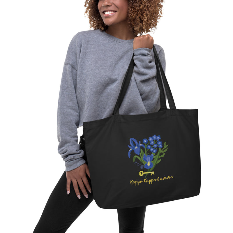 Kappa Kappa Gamma Fleur de Key design on large Organic Tote Bag in black shown on model&