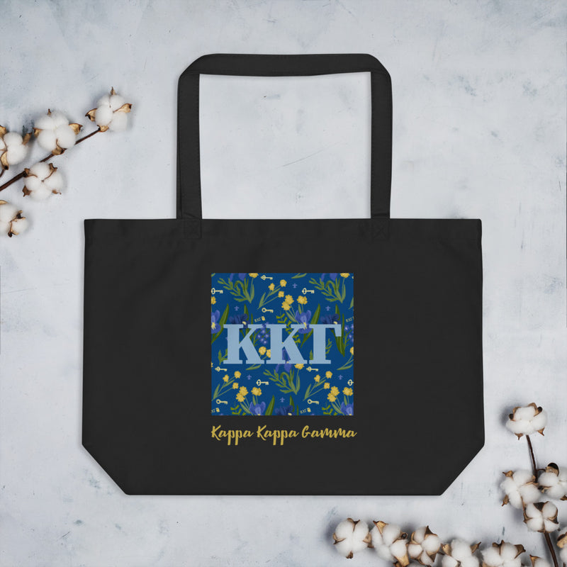Kappa Kappa Gamma Letters large tote bag in black shown flat with cotton blossoms