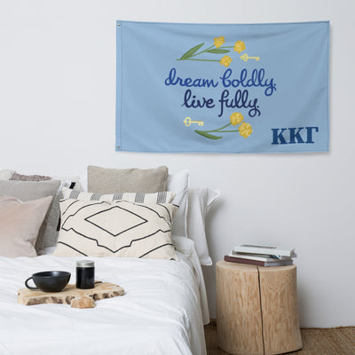 Kappa Kappa Gamma Dream Boldly. Live Fully Sorority motto Flag shown in bedroom setting