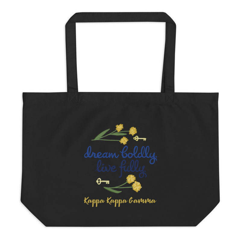 Kappa Kappa Dream Boldly. Live Fully. motto with keys printed on a black canvas shopping tote in black shown flat