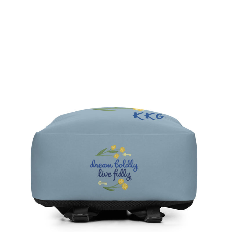 View of bottom of Kappa Kappa Gamma "Dream Boldly. Live Fully" sorority motto backpack. 