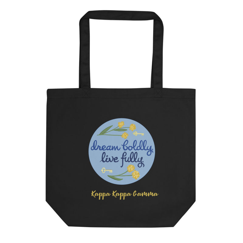 Kappa Kappa Gamma Dream Boldly. Live Fully. motto printed on a black canvas bag shown laying flat.