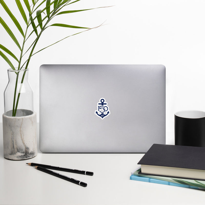 Delta Gamma 150th Anniversary Navy Blue Vinyl Stickers shown on laptop in office setting