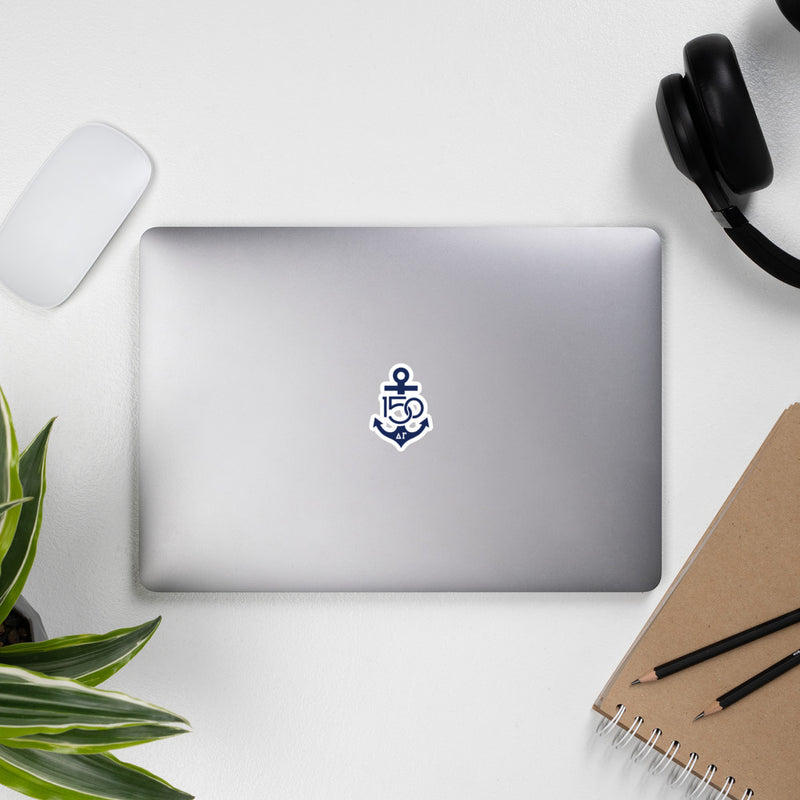 Delta Gamma 150th Anniversary Navy Blue Vinyl Stickers shown on laptop computer with office supplies