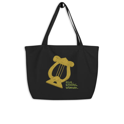 Alpha Chi Omega Real Strong Women Large Organic Tote Bag shown hanging on a hook
