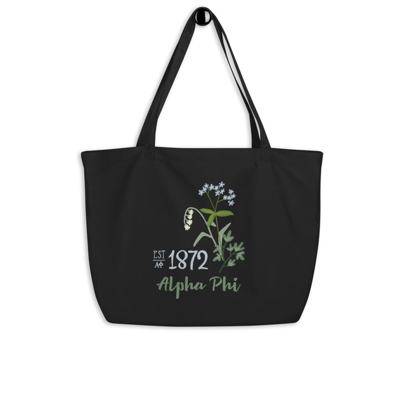 Alpha Phi 1872 Founders Day Design Large Organic Eco Tote Bag shown in black on a hook