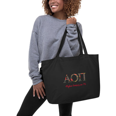 Alpha Omicron Pi Greek Letters Large Organic Eco Tote Bag shown in black on model's arm