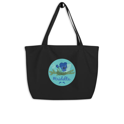 Tri Delta 1888 Large Organic Tote Bag in black shown on a hook