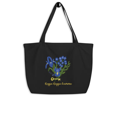 Kappa Kappa Gamma Fleur de Lis and Key Large Organic Tote Bag in black shown hanging up.