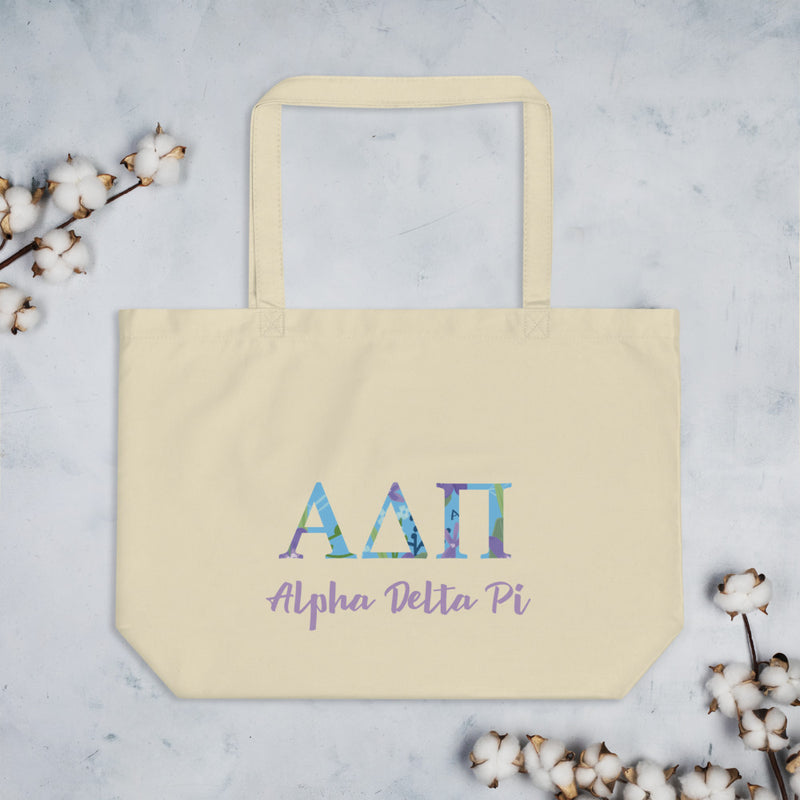 Alpha Delta Pi Greek Letters Large Organic Tote Bag shown in natural oyster color 
