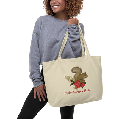 Alpha Gamma Delta Squirrel Mascot Large Organic Eco Tote Bag shown on model's arm in natural oyster color