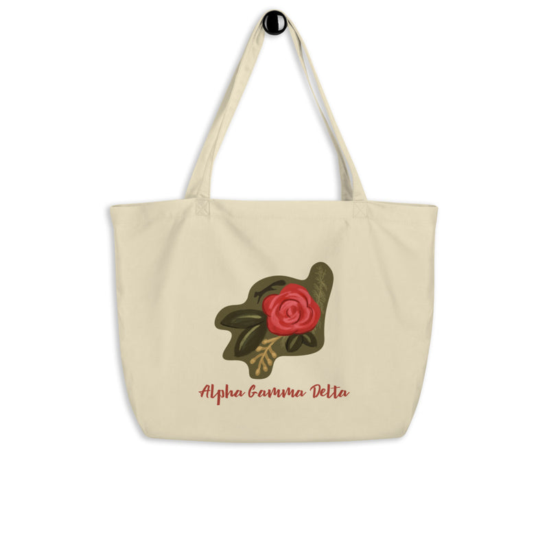 Alpha Gamma Delta Red Rose Large Organic Tote Bag in oyster color shown on hook