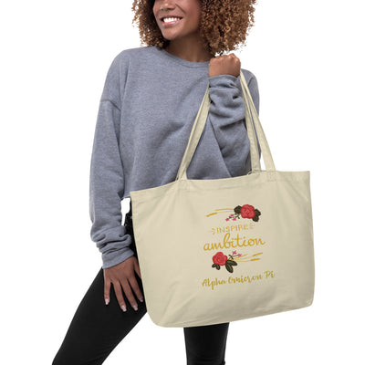 Alpha Omicron Pi Inspire Ambition Large Organic Eco Tote Bag in natural oyster color shown on model's arm
