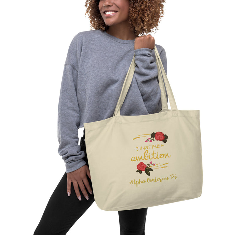 Alpha Omicron Pi Inspire Ambition Large Organic Eco Tote Bag in natural oyster color shown on model&