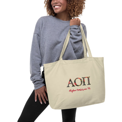 Alpha Omicron Pi Greek Letters Large Organic Eco Tote Bag shown in natural oyster on model's arm