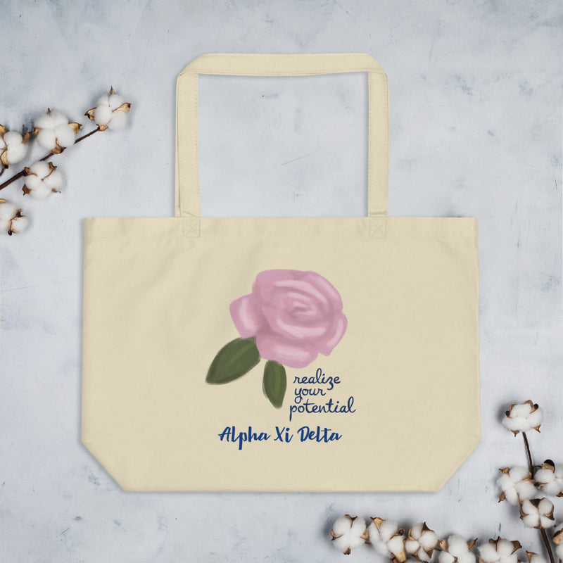 Alpha Xi Delta Realize Your Potential Large Organic Eco Tote Bag shown flat with cotton