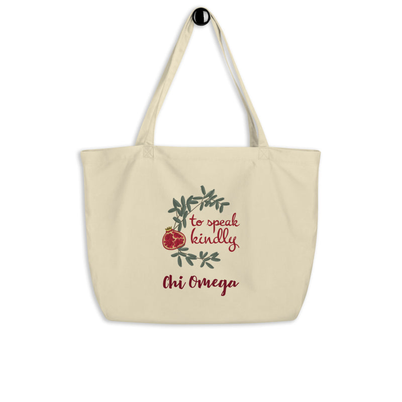 Chi Omega To Speak Kindly Large Organic Tote Bag shown on a hook