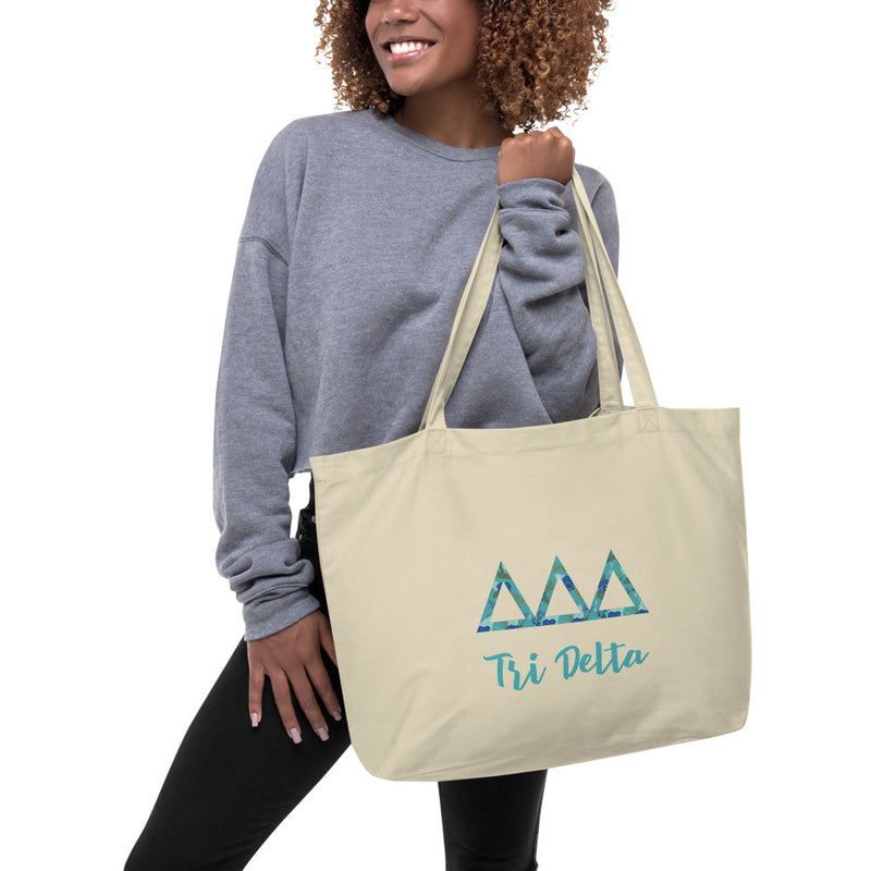 Tri Delta Greek Letters Large Organic Tote Bag in natural shown on model