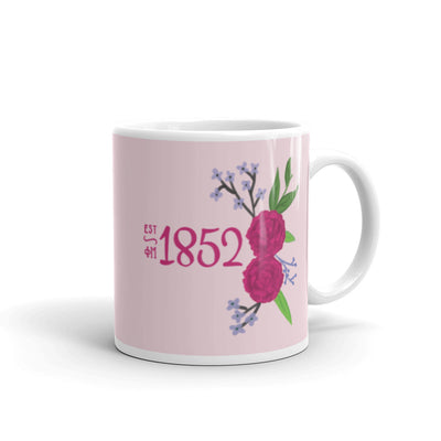 Phi Mu 1852 Mug in 11 oz size in pink shown with handle on right