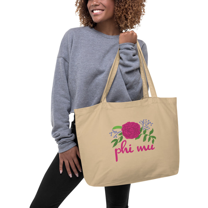 Large Phi Mu Carnation Tote Bag in natural oyster color shown on model&
