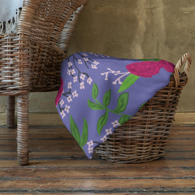Phi Mu Carnation Floral Print Throw Blanket, Purple in basket
