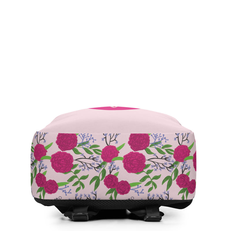 Phi Mu Motto Backpack showing bottom of bag with carnation floral print