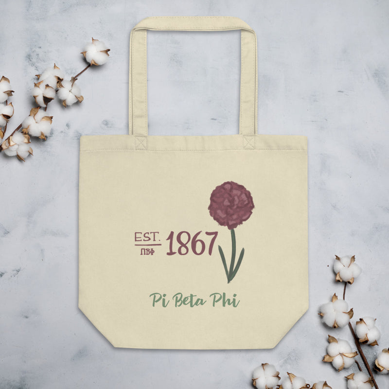 Pi Beta Phi 1867 Eco Tote Bag shown with cotton blossoms in natural laying flat