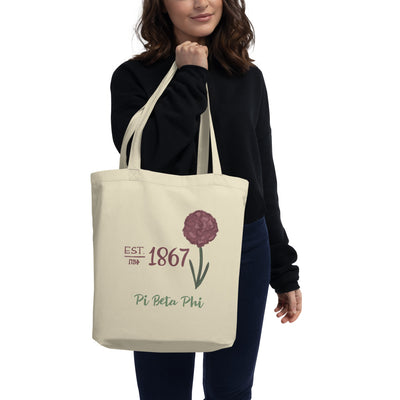 Pi Beta Phi 1867 Eco Tote Bag in natural oyster shown on model's arm