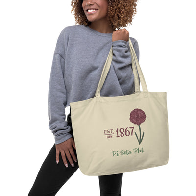 Pi Beta Phi 1867 Large Organic Tote Bag in natural oyster color shown on model's arm