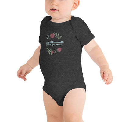 Pi Beta Phi motto baby onesie shown in dark gray with Pi Phi motto on front of baby model