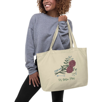 Pi Beta Phi Carnation and Arrow Large Organic Tote Bag in natural oyster shown on model's arm