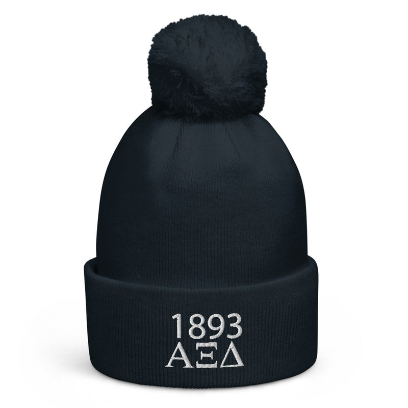 Alpha Xi Delta 1893 Founding Year Pom Pom Beanie in close up view in Navy blue